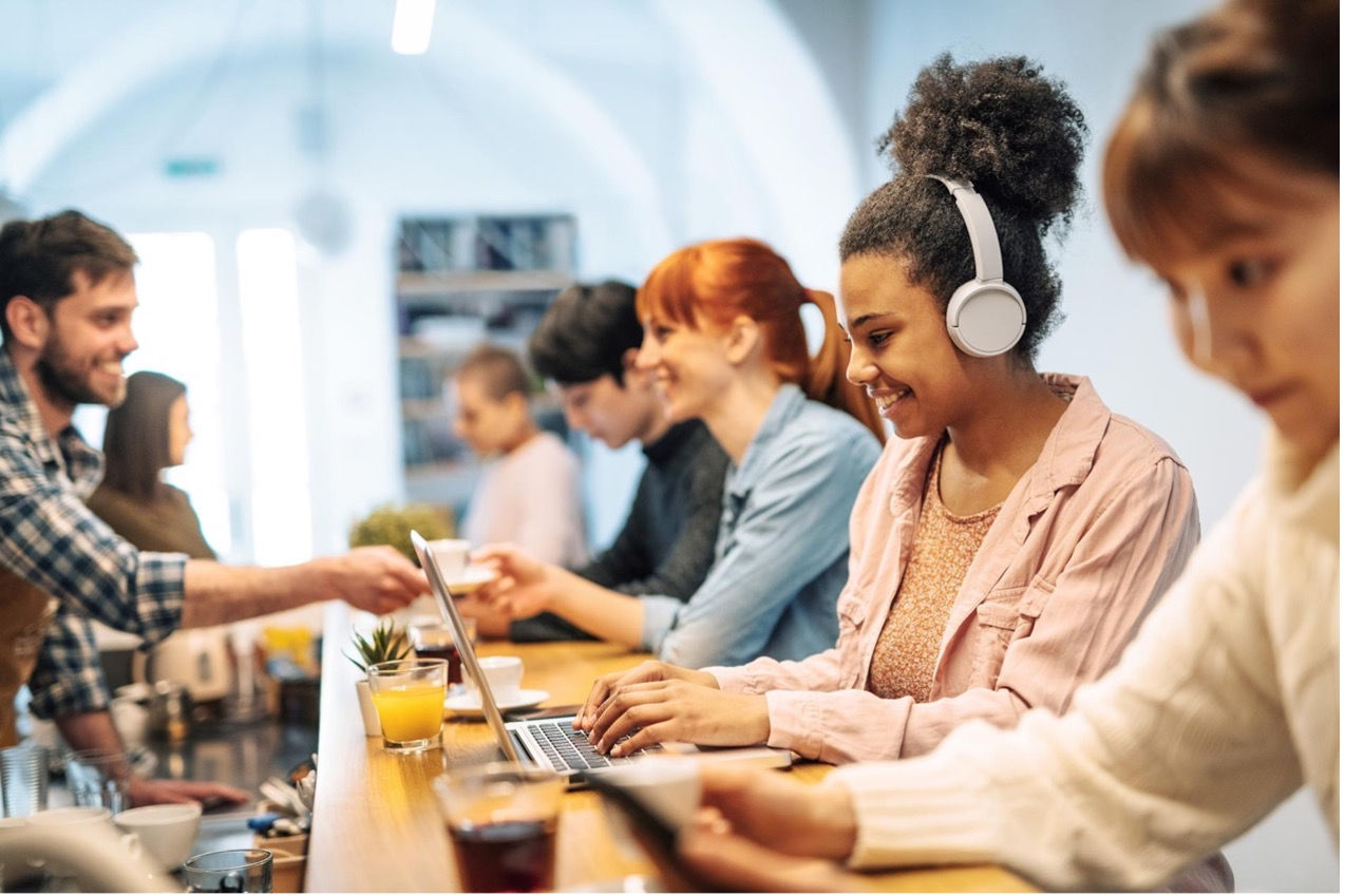 Customer service staff warmly welcoming clients